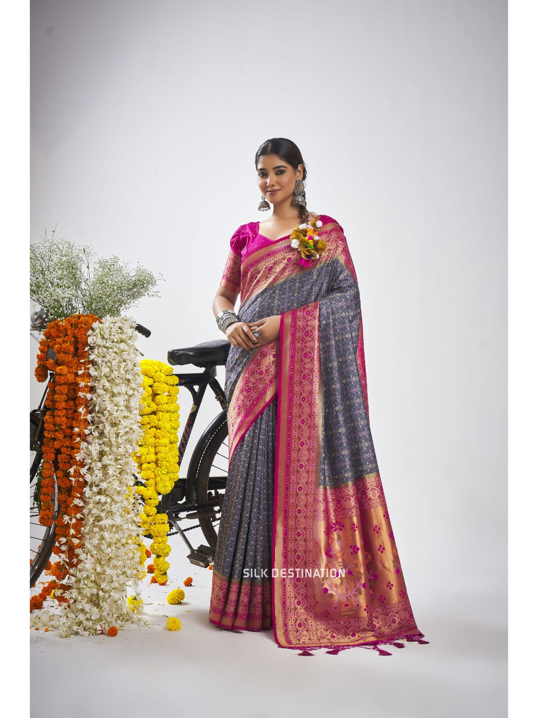 Chandrakala Saree: Gorgeous Grey with Rani Pink Pallu, traditional Patola Silk Saree with double Ikat Motifs