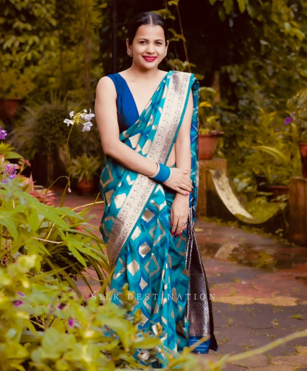 Ocean Serenity: Saree with Squared Turquoise Design, Tranquil Sky Blue Interior, Soft Beige Pallu, and Earthy Border