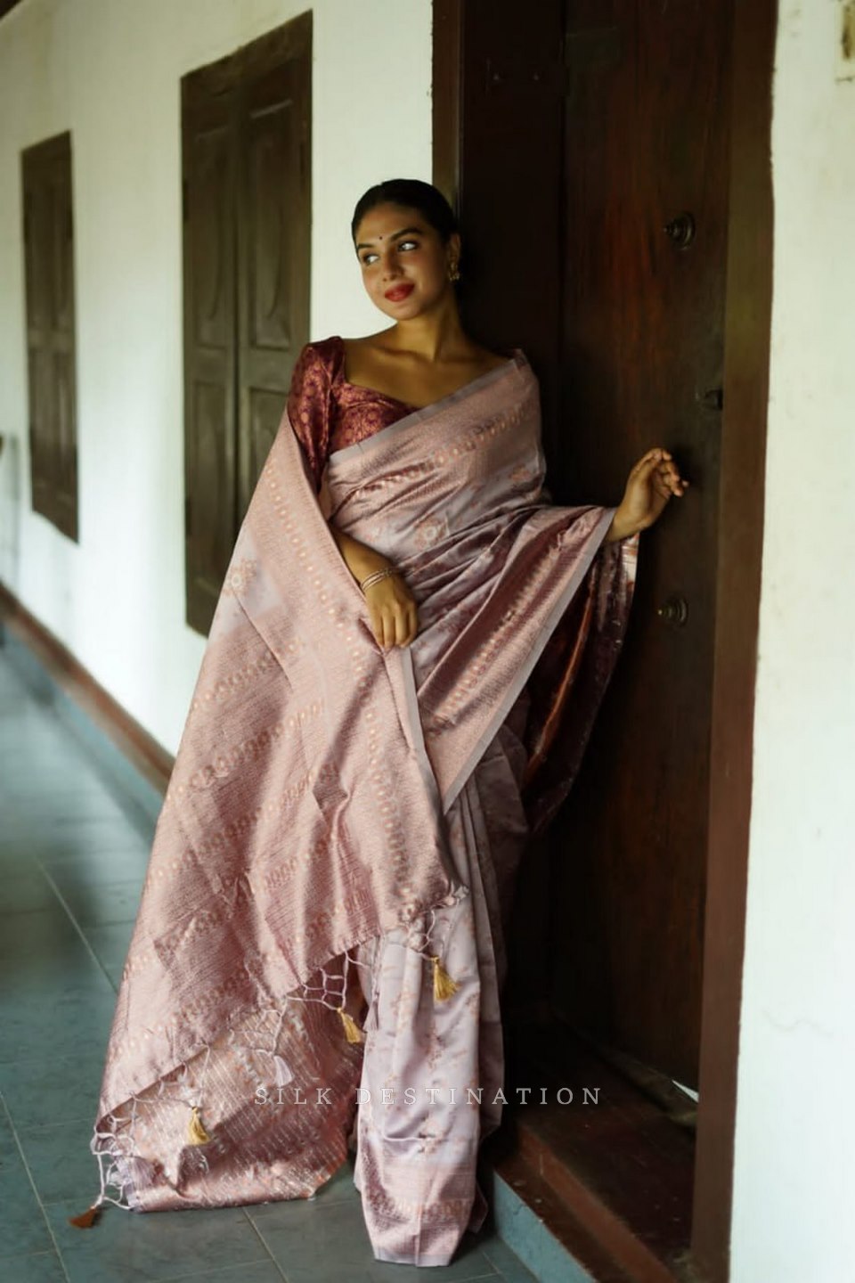 Taupe Tranquility: Taupe Gray Saree Featuring a Chocolate Brown Border and Intricate Design